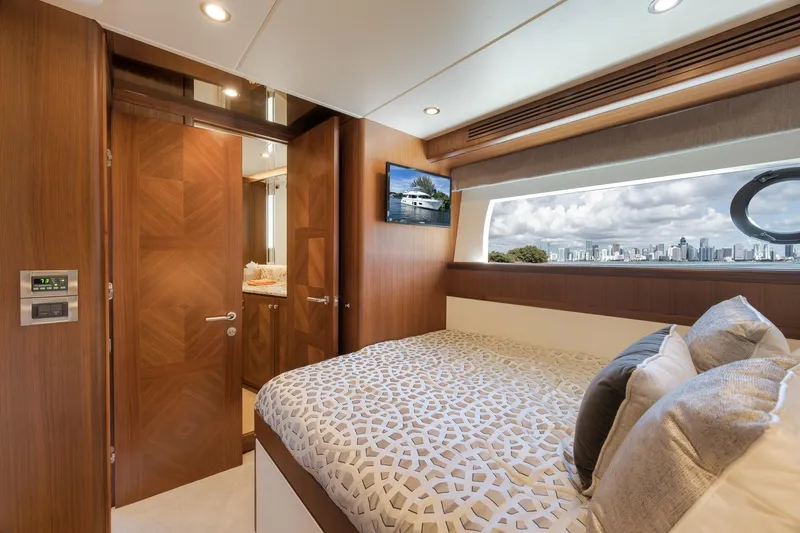 Slide: The Image of Luxurious bedroom interior of 2017 Ocean Alexander 85 E yacht with cityscape view. - 31