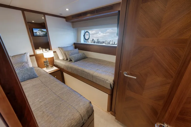 Slide: The Image of Luxurious cabin interior of 2017 Ocean Alexander 85 E yacht with twin beds and city view. - 34