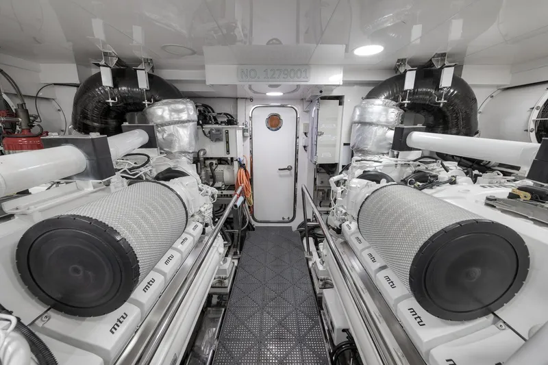 Slide: The Image of Engine room of 2017 Ocean Alexander 85 E yacht, featuring MTU engines and modern equipment. - 35