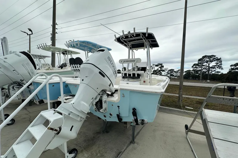 Slide: The Image of 2026 Bulls Bay 2200 XS boat with Suzuki outboard motor on display. - 3