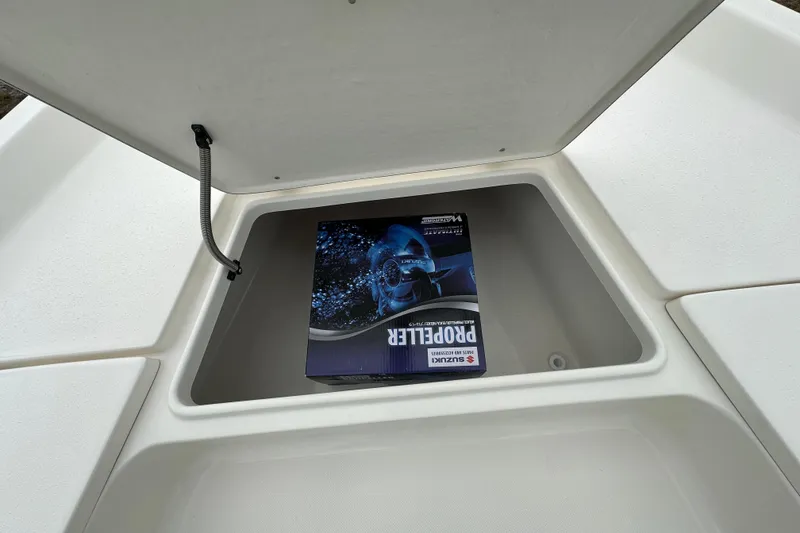Slide: The Image of Open storage compartment in 2026 Bulls Bay 2200 XS boat with propeller box inside. - 8