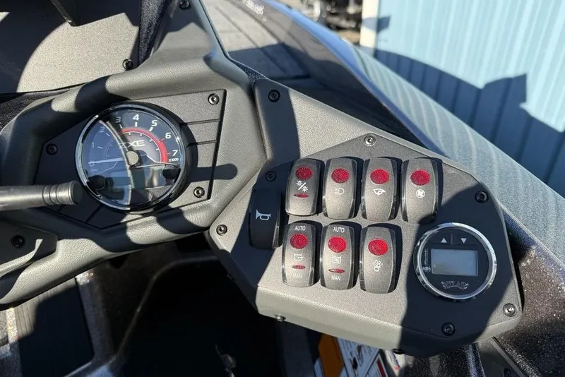 Slide: The Image of Dashboard of 2026 Skeeter ZXE20 boat with gauges and control panel. - 20