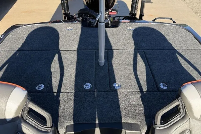 Slide: The Image of 2026 Skeeter ZXE20 boat deck with shadows and seating area. - 26