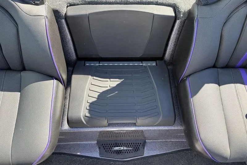 Slide: The Image of Interior seating of 2026 Skeeter ZXE21 boat with black and purple accents. - 16