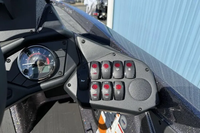 Slide: The Image of Dashboard of 2026 Skeeter ZXE21 boat with control panel and gauges. - 20