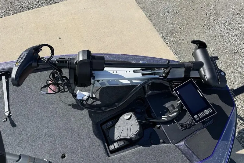 Slide: The Image of 2026 Skeeter ZXE21 boat deck with trolling motor and navigation system. - 8