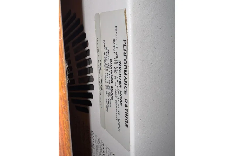 Slide: The Image of 1974 Bertram 31 Flybridge Cruiser performance ratings label close-up. - 24