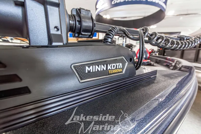 Slide: The Image of Minn Kota Terrova motor on Recon 895 SC, 2026 model, at Lakeside Marine showroom. - 9