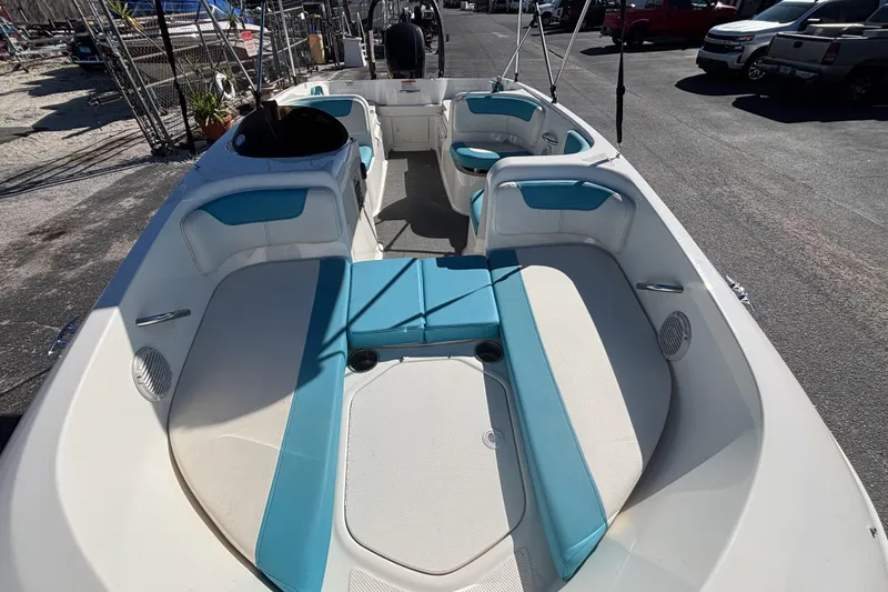 Slide: The Image of 2021 Bayliner Element E18 boat with spacious seating and modern design. - 10