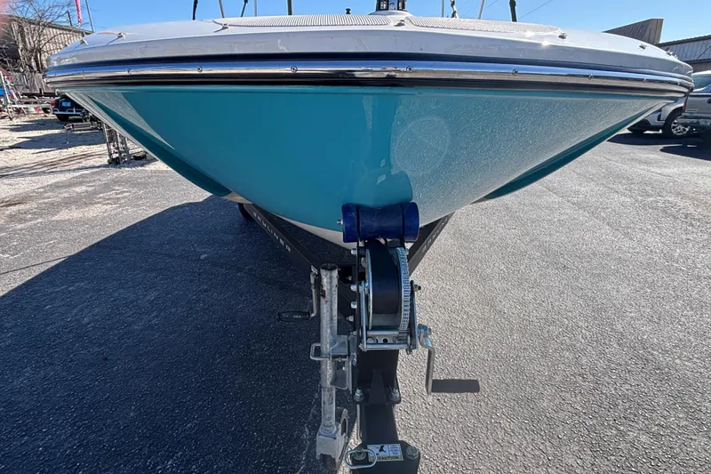 Slide: The Image of 2021 Bayliner Element E18 boat on trailer, front view, blue hull. - 7