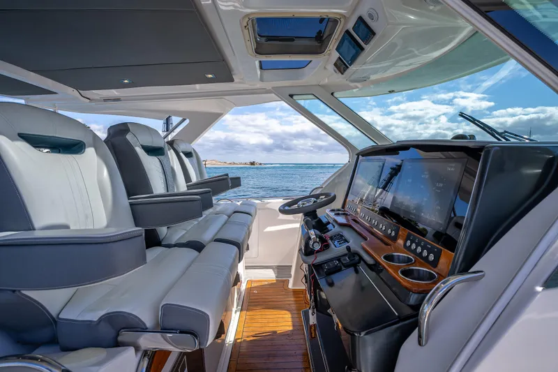 Slide: The Image of Interior of 2019 Tiara Sport 38 LS yacht with luxurious seating and advanced navigation system. - 21
