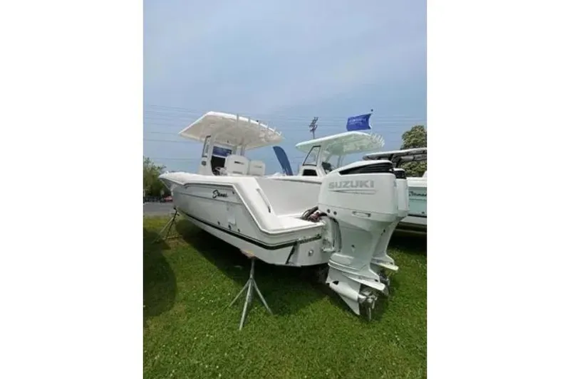 Slide: The Image of 2022 Stamas 31T Aventura boat with Suzuki outboard engine on display. - 15