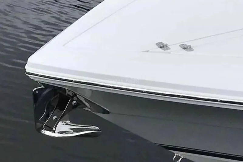 Slide: The Image of 2022 Stamas 31T Aventura boat bow with anchor, on calm water. - 16