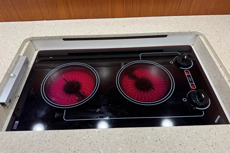 Slide: The Image of Electric stove with two glowing burners on a Tiara 43, 2007 model yacht. - 18