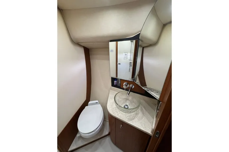 Slide: The Image of Luxurious bathroom in 2007 Tiara 43 yacht with modern fixtures and elegant design. - 4