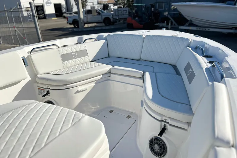 Slide: The Image of 2026 Sea Fox 268 Commander boat interior with white cushioned seating and modern design. - 13