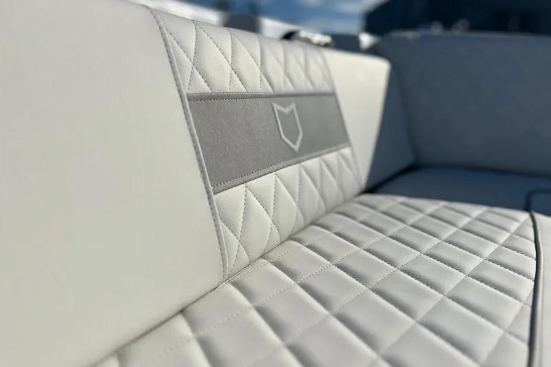 Slide: The Image of Luxurious seating on 2026 Sea Fox 268 Commander boat with quilted upholstery design. - 14