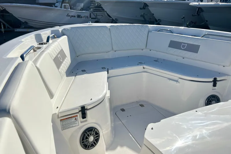 Slide: The Image of 2026 Sea Fox 268 Commander boat interior with cushioned seating and speakers. - 15