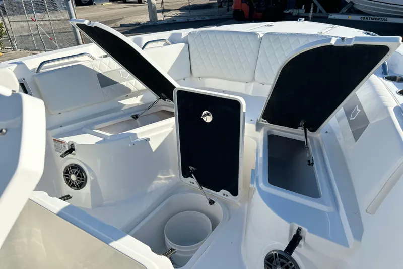 Slide: The Image of 2026 Sea Fox 268 Commander boat interior with open storage compartments and seating. - 18