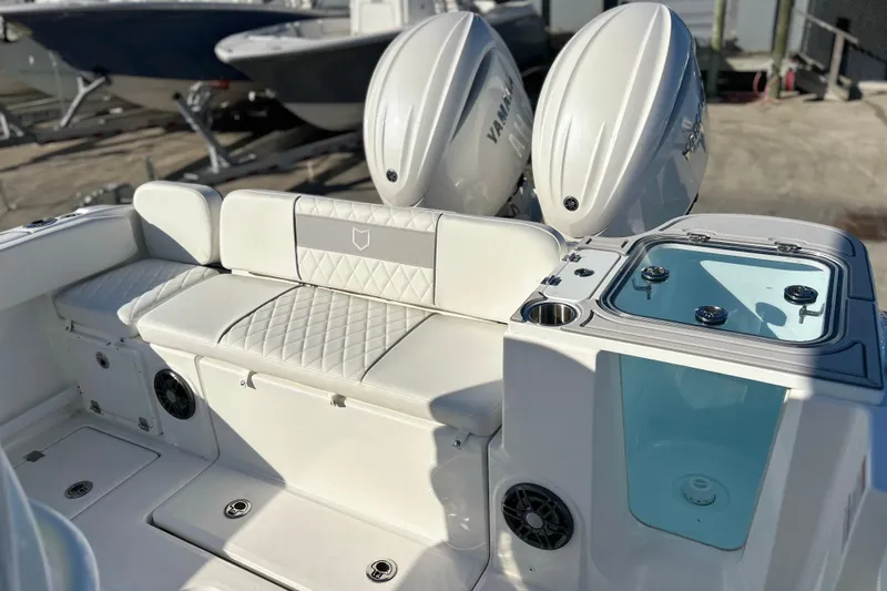 Slide: The Image of 2026 Sea Fox 268 Commander boat interior with dual Yamaha engines and seating area. - 30