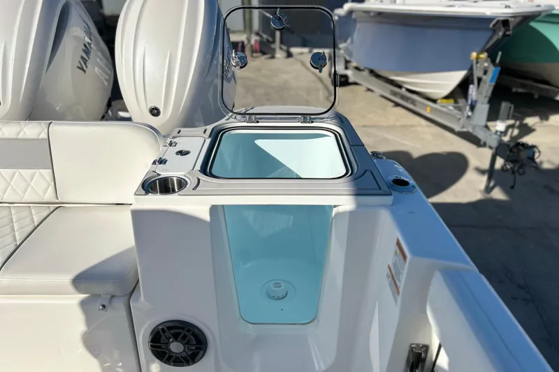 Slide: The Image of 2026 Sea Fox 268 Commander boat interior with open storage compartment and seating. - 31