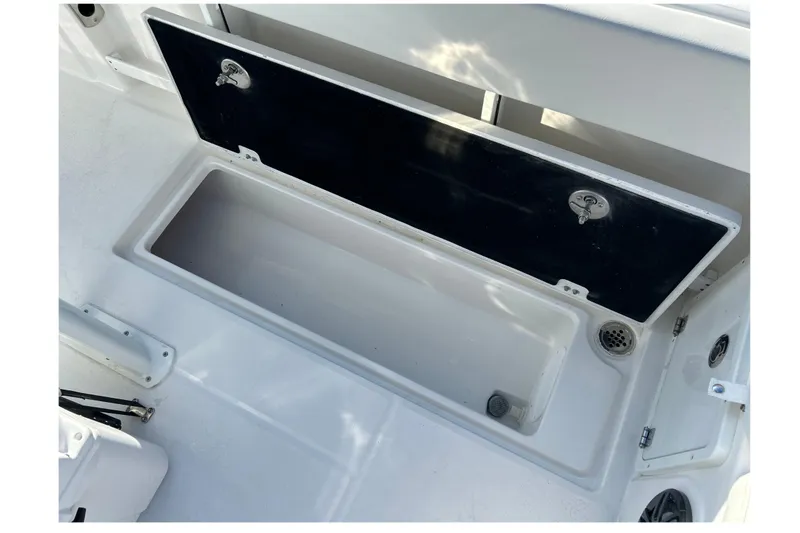 Slide: The Image of Open storage compartment on 2026 Sea Fox 268 Commander boat deck. - 34