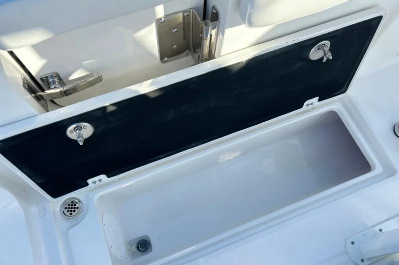 Slide: The Image of Open storage compartment on 2026 Sea Fox 268 Commander boat. - 35