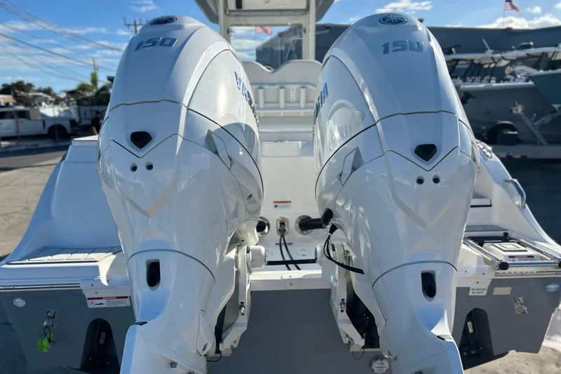 Slide: The Image of 2026 Sea Fox 268 Commander with dual Yamaha 150 engines, rear view. - 39