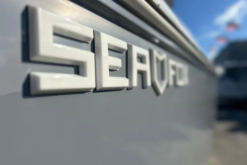 Slide: The Image of Close-up of 2026 Sea Fox 268 Commander logo on boat hull. - 42
