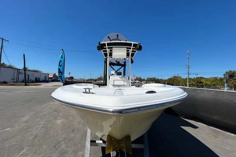 Slide: The Image of 2020 Clearwater 2000 Center Console boat on display under clear blue sky. - 10