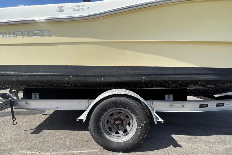 Slide: The Image of Clearwater 2000 Center Console boat on trailer, side view, 2020 model. - 103