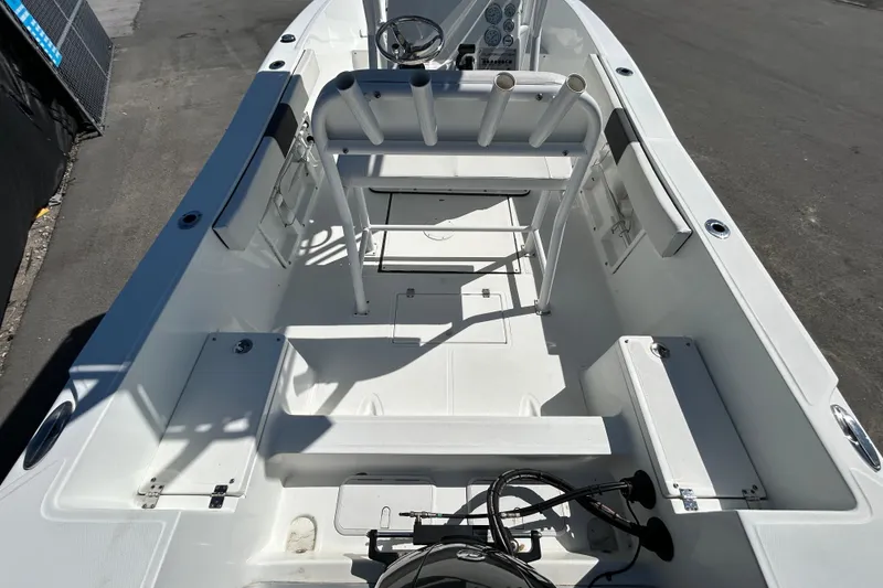Slide: The Image of 2020 Clearwater 2000 Center Console boat interior with seating and steering wheel. - 11