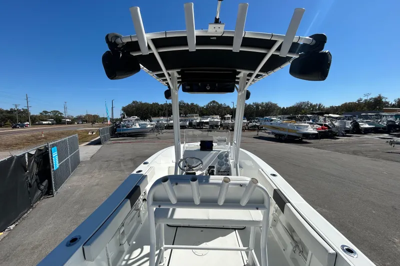 Slide: The Image of 2020 Clearwater 2000 Center Console boat in a marina, clear sky background. - 12