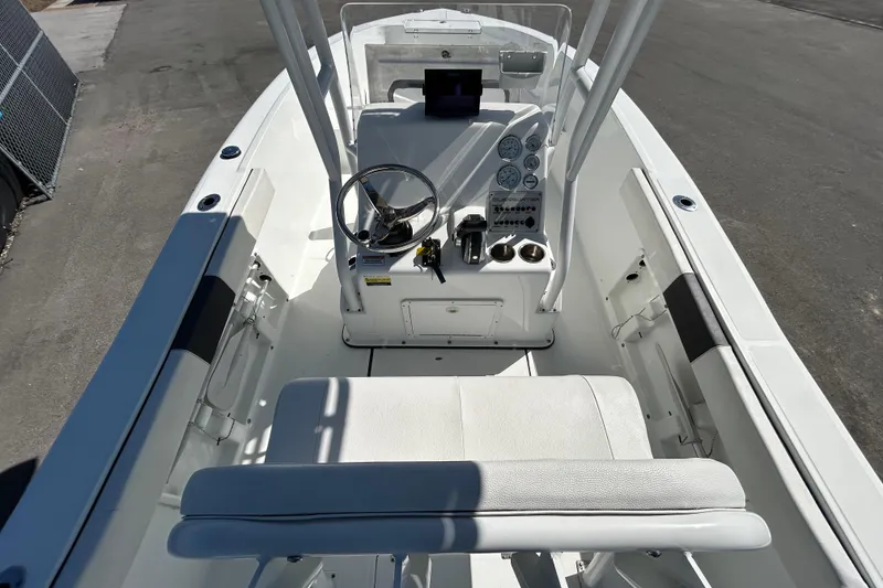 Slide: The Image of 2020 Clearwater 2000 Center Console boat interior with steering wheel and controls. - 14
