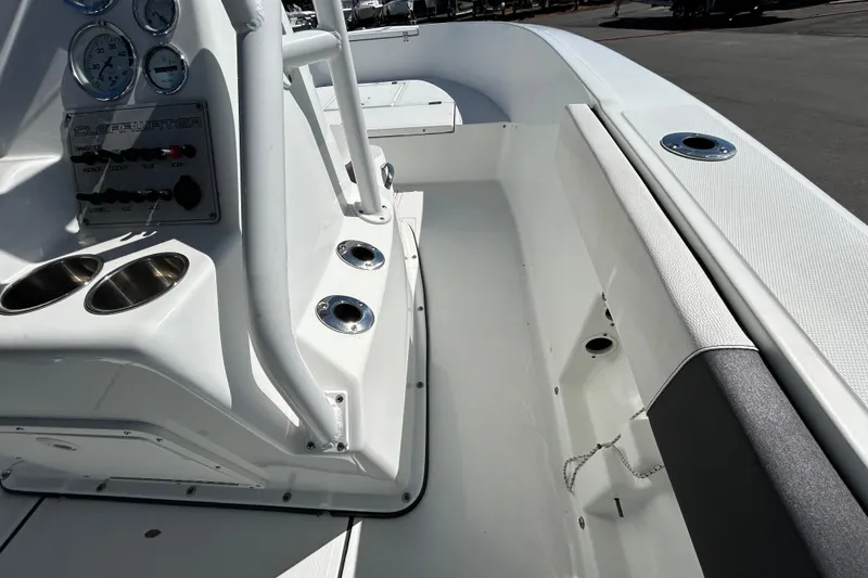Slide: The Image of 2020 Clearwater 2000 Center Console boat interior with control panel and cup holders. - 17