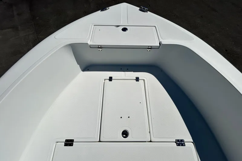 Slide: The Image of 2020 Clearwater 2000 Center Console boat deck with storage compartments. - 20