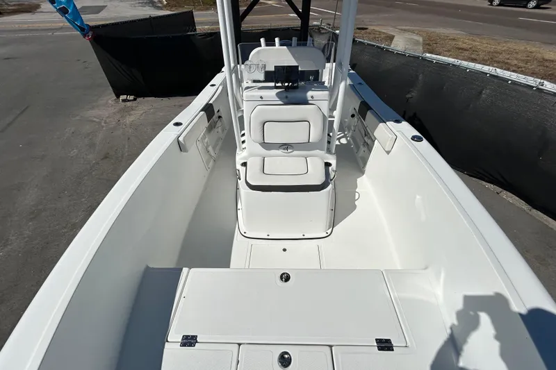 Slide: The Image of 2020 Clearwater 2000 Center Console boat interior with seating and console view. - 24