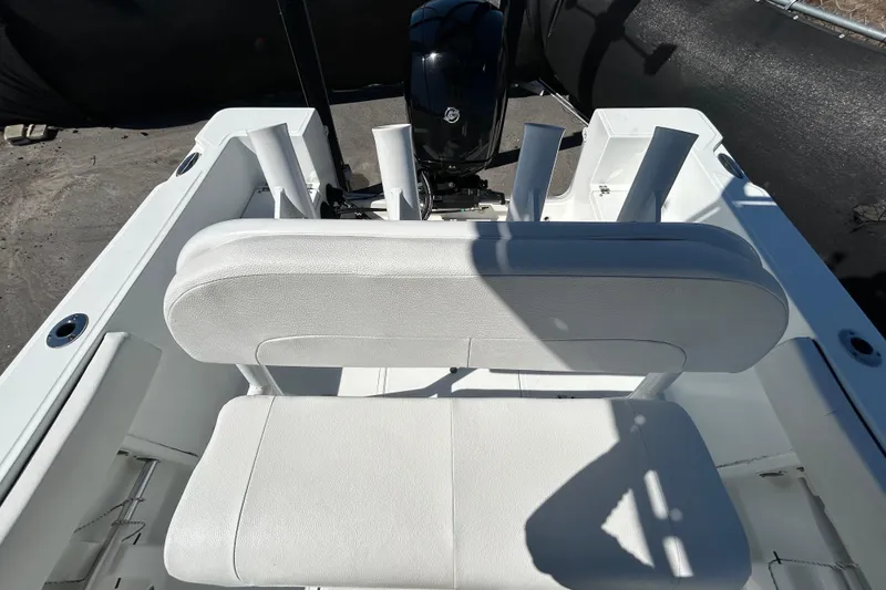 Slide: The Image of 2020 Clearwater 2000 Center Console boat interior with seating and rod holders. - 29