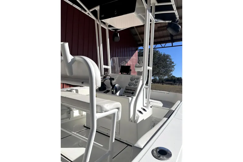 Slide: The Image of Clearwater 2000 Center Console 2020 boat with 150 horsepower engine, rear view. - 4