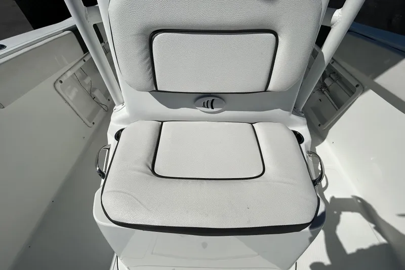 Slide: The Image of White cushioned seat on 2020 Clearwater 2000 Center Console boat. - 51