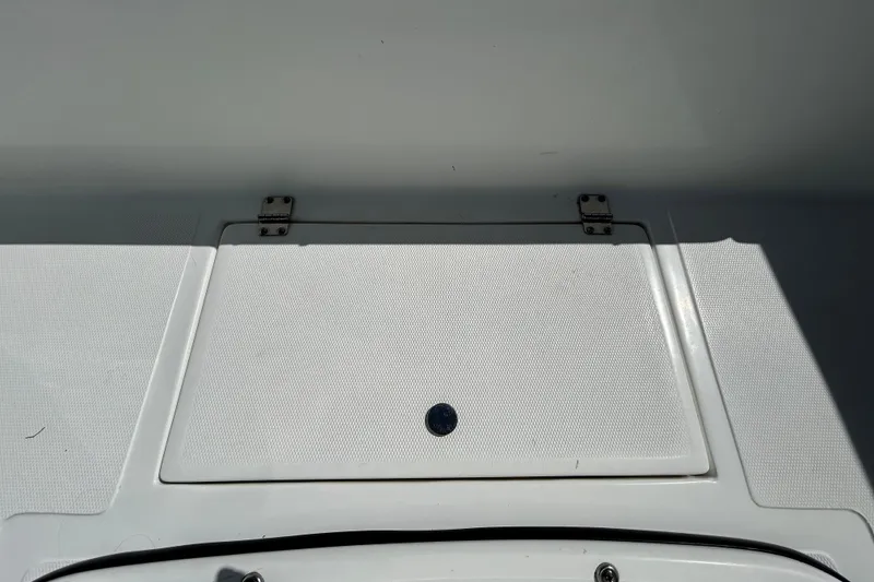 Slide: The Image of 2020 Clearwater 2000 Center Console boat deck with storage hatch. - 56