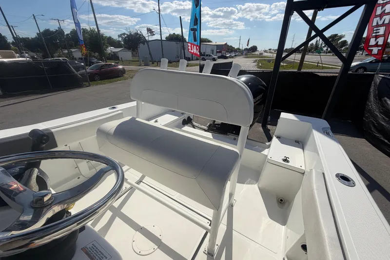 Slide: The Image of Clearwater 2000 Center Console boat, 2020 model, featuring helm and seating area. - 83