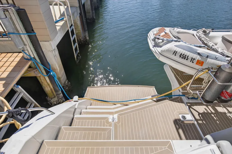 Slide: The Image of Luxury Leopard 50 yacht docked with inflatable boat, 2021 model. - 108