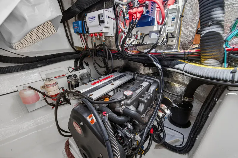 Slide: The Image of Engine room of 2021 Leopard 50 yacht with detailed wiring and components. - 115