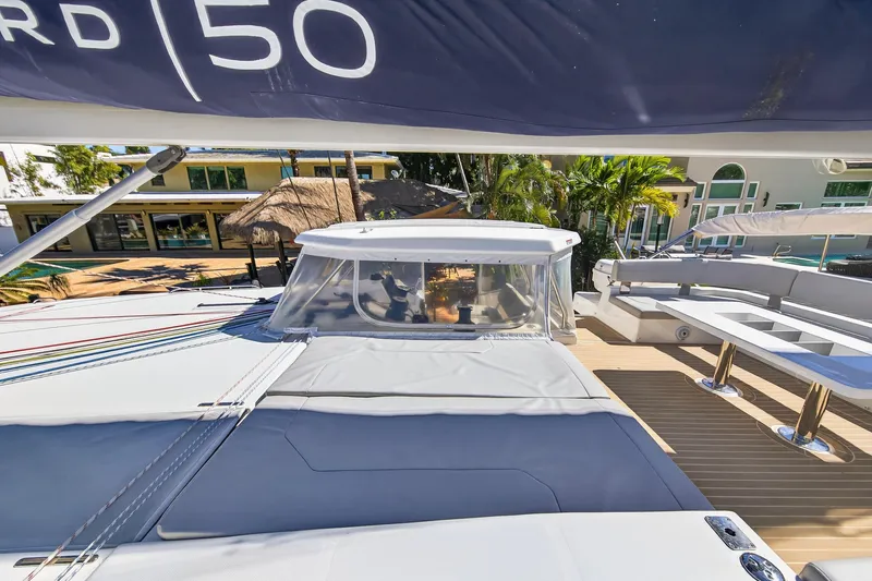 Slide: The Image of 2021 Leopard 50 yacht deck with seating and canopy, showcasing luxury and modern design. - 15