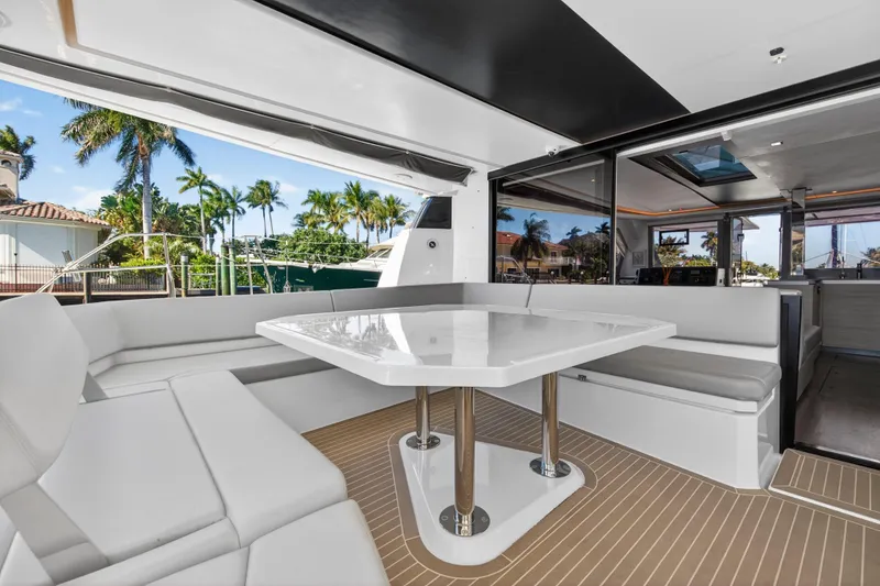 Slide: The Image of Luxurious 2021 Leopard 50 yacht interior with sleek seating and modern design. - 23