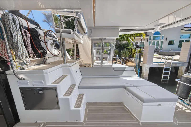 Slide: The Image of Luxurious 2021 Leopard 50 yacht deck with seating, ropes, and helm station. - 27