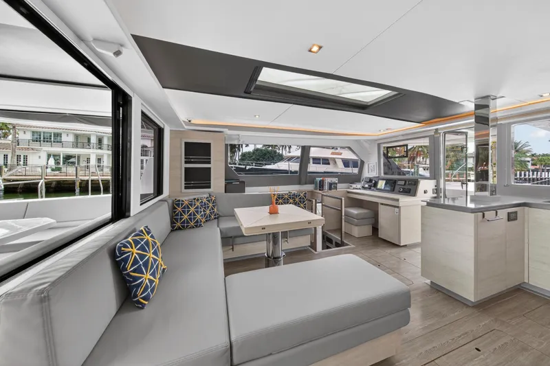 Slide: The Image of Luxurious interior of 2021 Leopard 50 yacht with modern seating and large windows. - 52