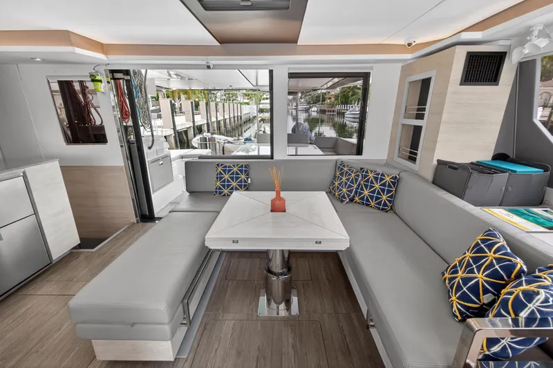 Slide: The Image of Luxurious Leopard 50 yacht interior with modern seating, geometric cushions, and elegant decor, 2021 model. - 53