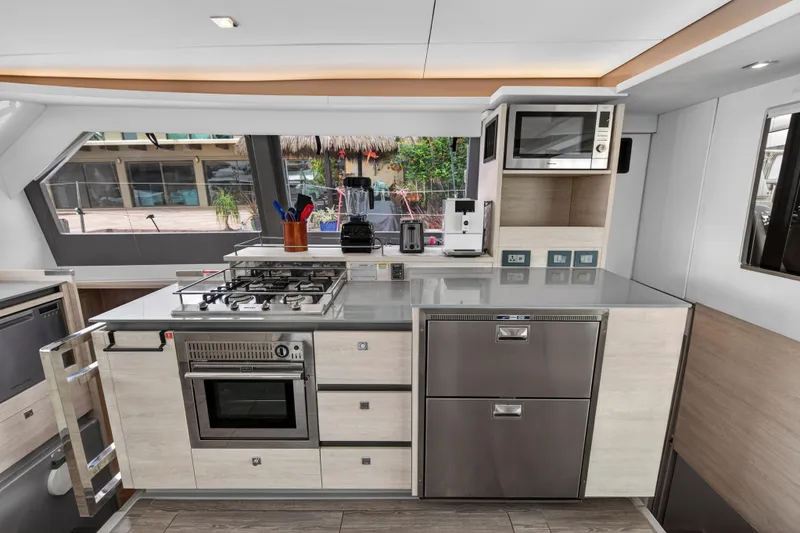 Slide: The Image of Modern kitchen interior on 2021 Leopard 50 yacht with appliances and sleek design. - 55